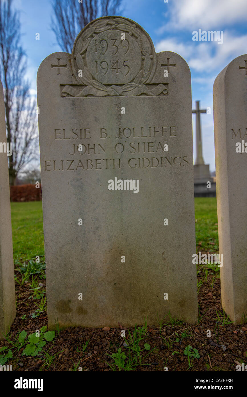 The 1939-1945 Bath Air Raid Grave of Elizabeth Giddings, Elsie Beatrice Jolliffe and John O`Shea at Haycombe Cemetery, Bath, England Stock Photo